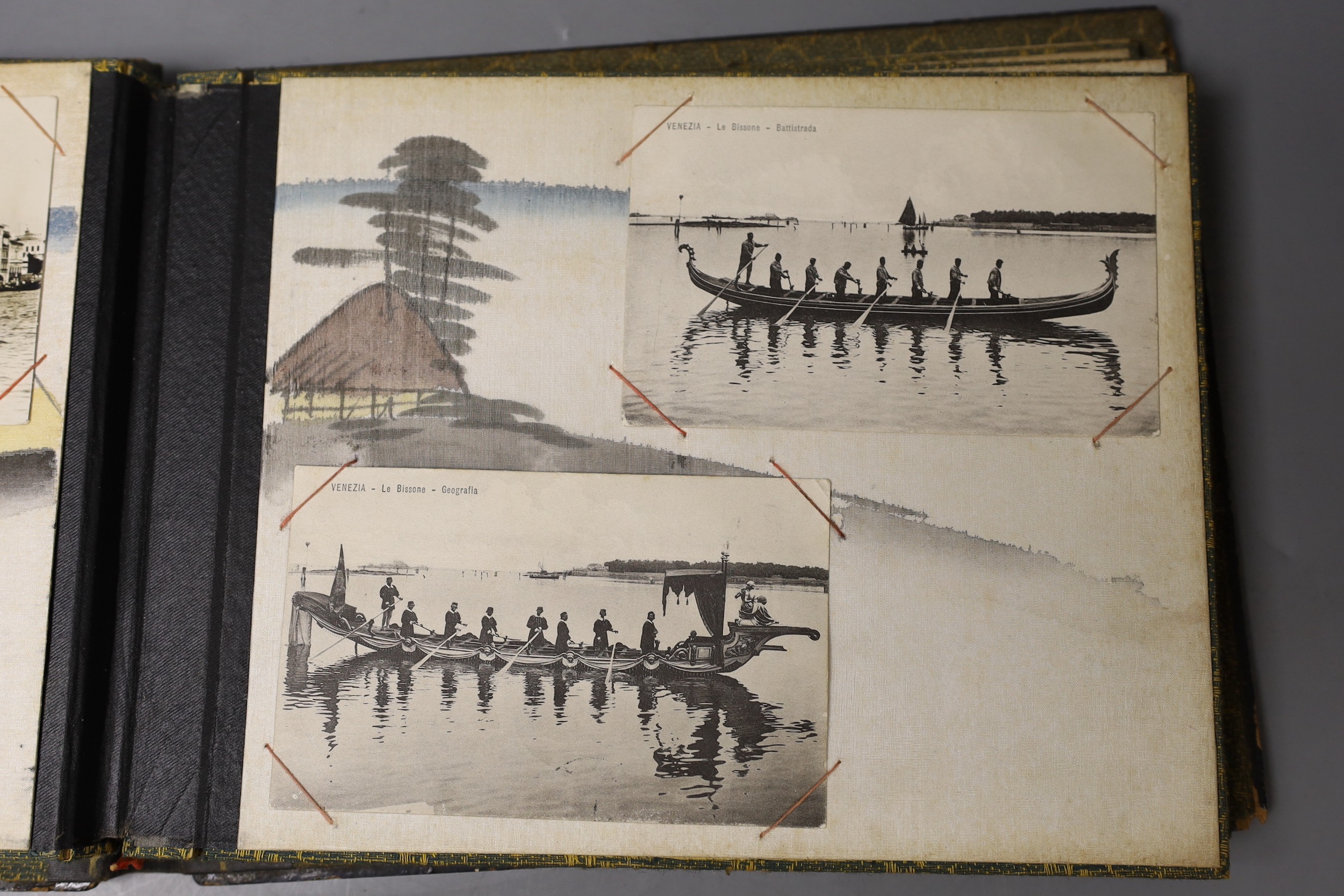 A black lacquer album containing photos of Venice, Penang and China